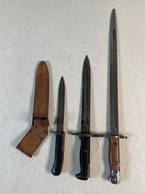 Lot 117 - Three bayonets, comprising an example marked...