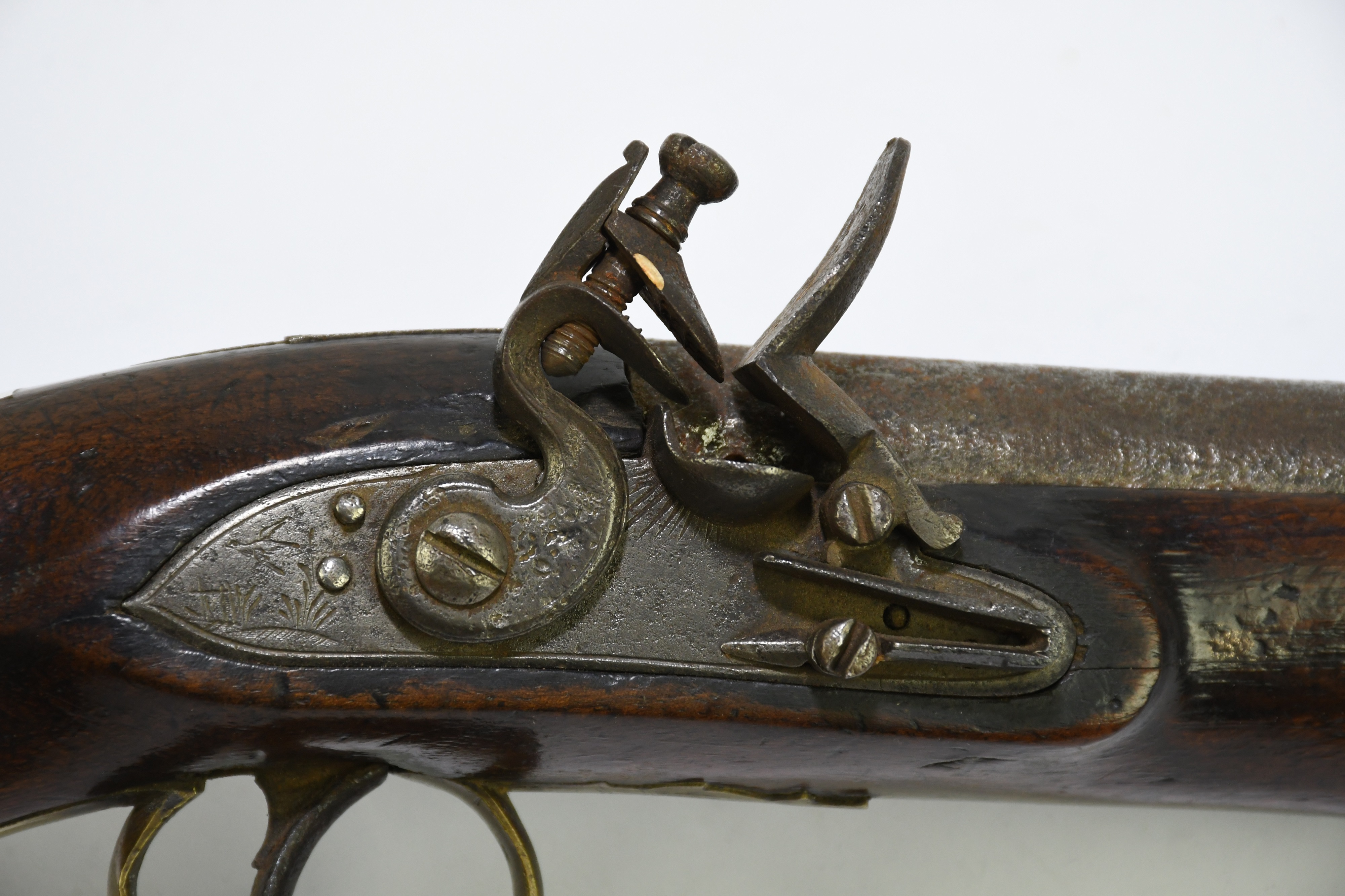 Lot 2540 - A 19th century flintlock pistol with brass