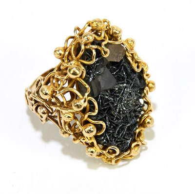 Lot 19 - IN THE STYLE OF JOHN DONALD; a 9ct yellow gold...
