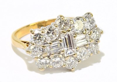 Lot 4 - An 18ct yellow gold and diamond cluster ring...