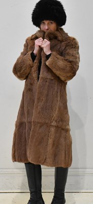 Lot 280 - A full length light brown dyed coney fur coat,...