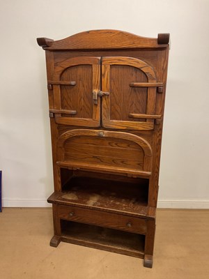 Lot 960 - An oak kitchen cupboard with a two door top...