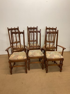 Lot 895 - ERCOL; a set of dining chairs from the...