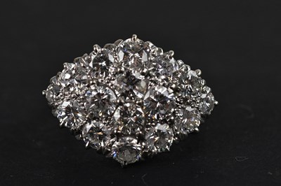 Lot 2244 - A white metal diamond cluster ring, set with...