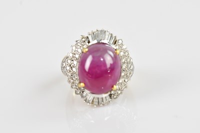 Lot 2264 - An 18ct yellow gold diamond and ruby dress...