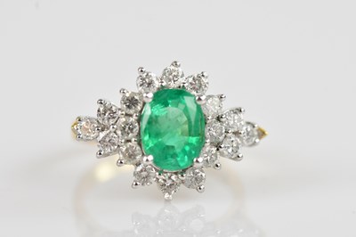 Lot 2250 - An 18ct yellow gold diamond and emerald...