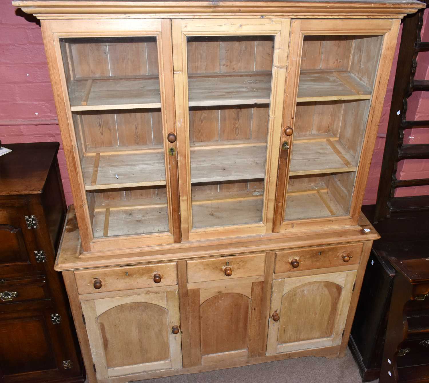 Lot 1586 - An old pine bookcase