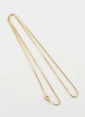 Lot 2040 - A yellow metal fine link necklace, stamped...