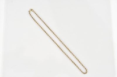 Lot 2076 - A yellow metal necklace, the clasp stamped...