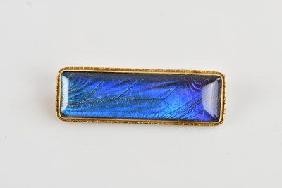 Lot 594 - A yellow metal bar brooch, the rectangular...