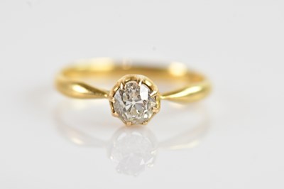 Lot 646 - A yellow metal solitaire ring, weight 1.9g.