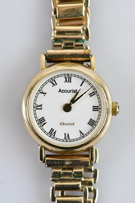 Lot 697 - ACCURIST; a lady’s 9ct gold wristwatch, the...