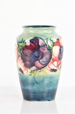 Lot 1228 - MOORCROFT; an 'Anemone' pattern vase,...