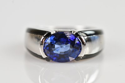 Lot 2258 - A white metal diamond and sapphire dress ring,...