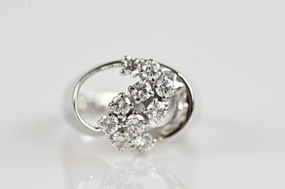 Lot 2289 - A white metal diamond set cluster ring, set...