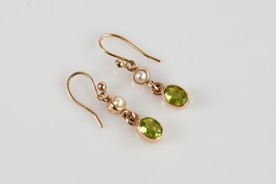 Lot 1394 - A pair of yellow metal seed pearl and peridot...