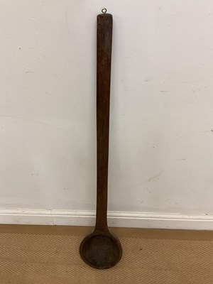 Lot 48 - A large turned elm wood skimming ladle, length...