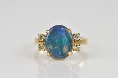 Lot 2350 - A yellow metal diamond and black opal dress...