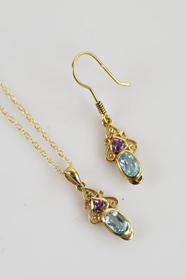 Lot 610 - A 9ct gold gem set pendant and single earring,...