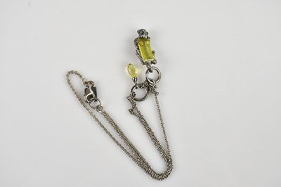 Lot 2213 - A sterling silver necklace set with a white...