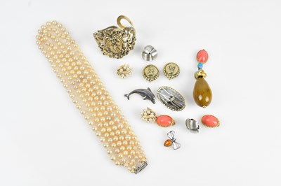 Lot 321 - ALICE CAVINESS; a large pendant with a tan,...
