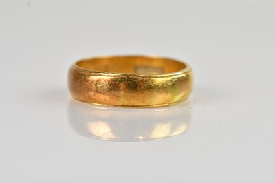 Lot 2287 - A 22ct yellow gold wedding band, size W, 8.3g