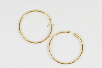 Lot 1392 - A pair of 9ct yellow gold hoop earrings,...