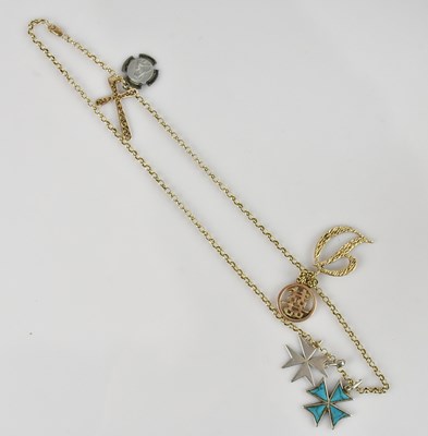 Lot 2048 - A 9ct yellow gold chain supporting six...