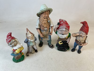 Lot 854 - Five concrete cast garden gnomes, tallest 46cm.