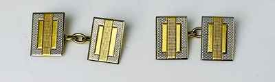Lot 733 - A pair of yellow and white metal two-tone...