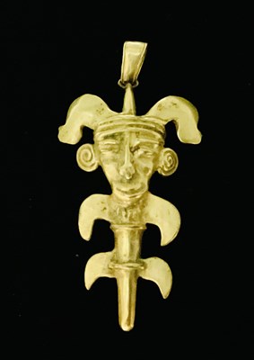 Lot 722 - A South American inspired yellow metal pendant...