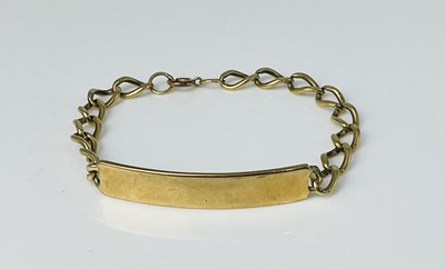 Lot 678 - A 9ct yellow gold ID bracelet, length 17cm,...