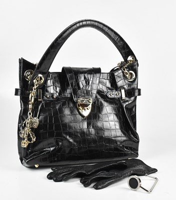 Lot 164 - ASPINAL OF LONDON; a large black embossed...