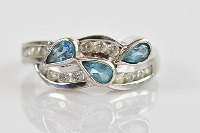 Lot 2470 - An 18ct white gold diamond set dress ring, set...