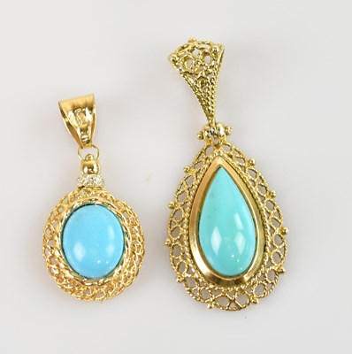 Lot 2216 - A yellow metal turquoise set pendant, stamped '...