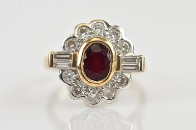 Lot 2509 - A 9ct yellow gold diamond and ruby cluster...