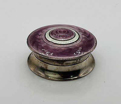 Lot 633 - A George V hallmarked silver and pink and...