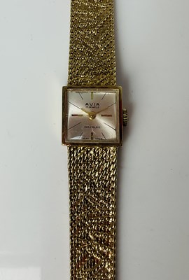 Lot 805 - AVIA; a lady's vintage 9ct gold wristwatch,...