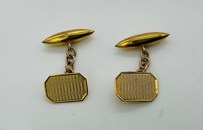 Lot 748 - A pair of 9ct yellow gold cufflinks, with...
