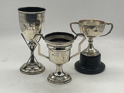 Lot 630 - A George V hallmarked silver golfing trophy...