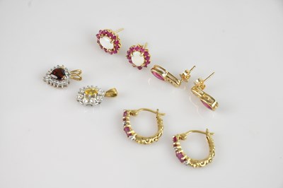 Lot 1401 - An 18ct yellow gold diamond and citrine set...