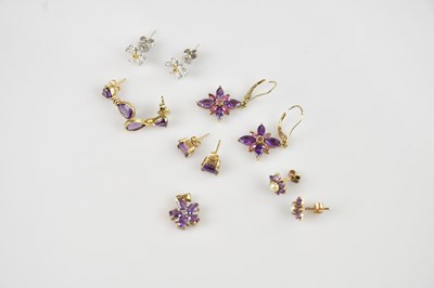 Lot 1414 - A 9ct yellow gold amethyst set pendant, with a...