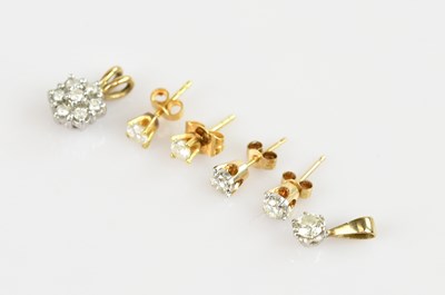 Lot 1390 - Two pairs of diamond set yellow metal mounted...