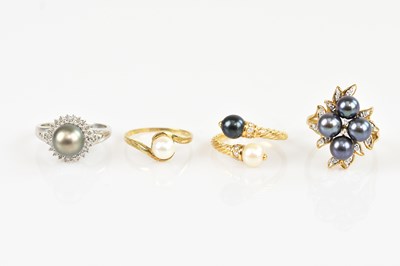 Lot 2558 - A 9ct white gold and black pearl dress ring,...