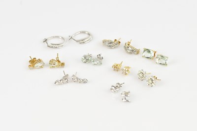 Lot 1419 - A pair of 9ct white gold diamond set hoop...