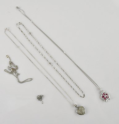 Lot 2192 - A white metal diamond set pendant, set with a...