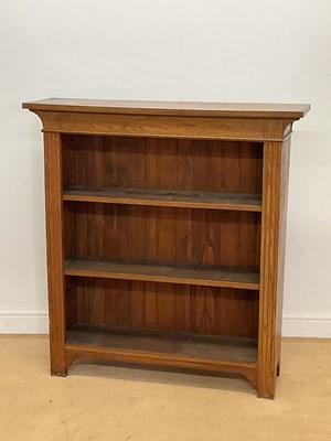 Lot 961 - An oak open bookcase with two shelves, height...
