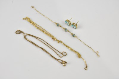 Lot 1255 - A yellow metal fine link bracelet, set with...