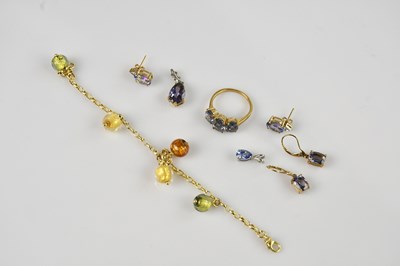 Lot 1418 - A 9ct yellow gold dress ring set with three...