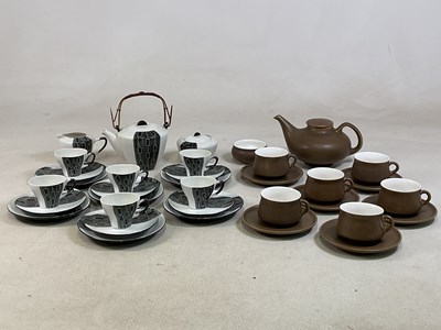Lot 394 - A 1960s decorative teaset with a black and...
